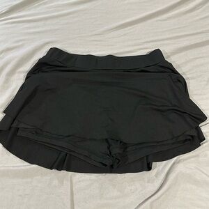 New women’s black tennis skirt size L